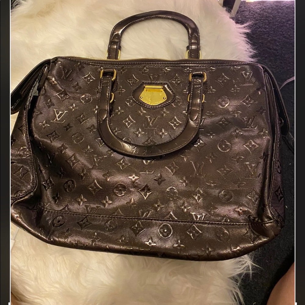 Brown design handbag luggage